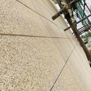 安顺 黄金麻花岗岩荔枝面外墙干挂石材效果示例