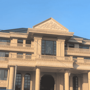 安顺黄金麻别墅外墙干挂石材效果示例